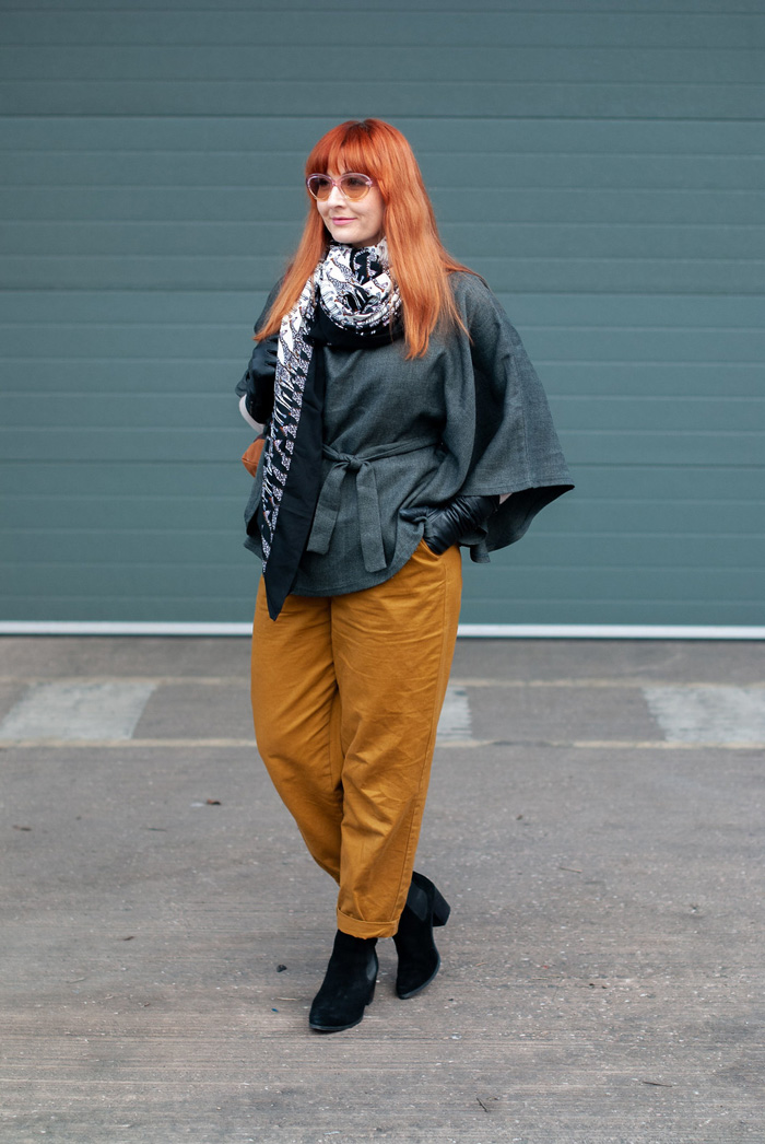 Catherine wearing wrap poncho top, scarf and trouser | 40plusstyle.com 