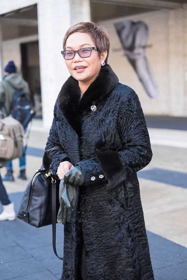 street style fashion and fur coats worn by women over 40 during New