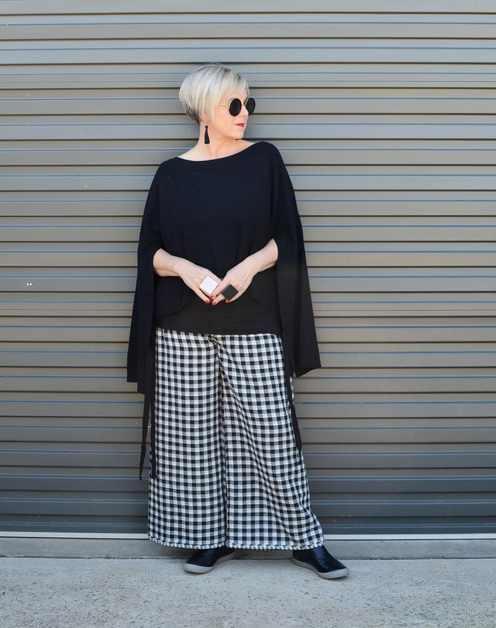 Deborah wearing black top and checkered pants | 40plusstyle.com
