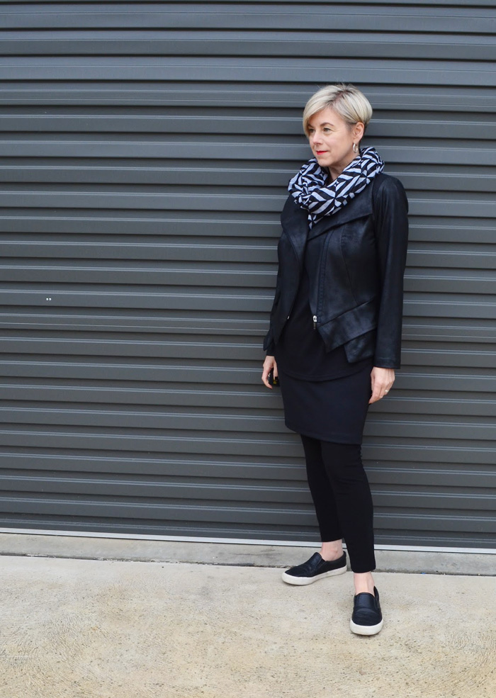 Deborah all black outfit with black and white scarf | 40plusstyle.com