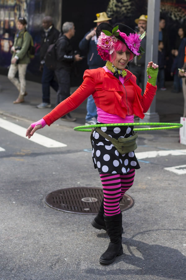 Doing the hoola hoop in colorful attire | 40plusstyle.com