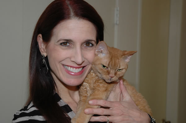 Debbie with her beloved cat Coco | 40plusstyle.com