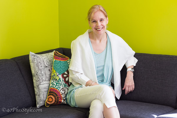 in front of a bright lime green wall | 40plusstyle.com