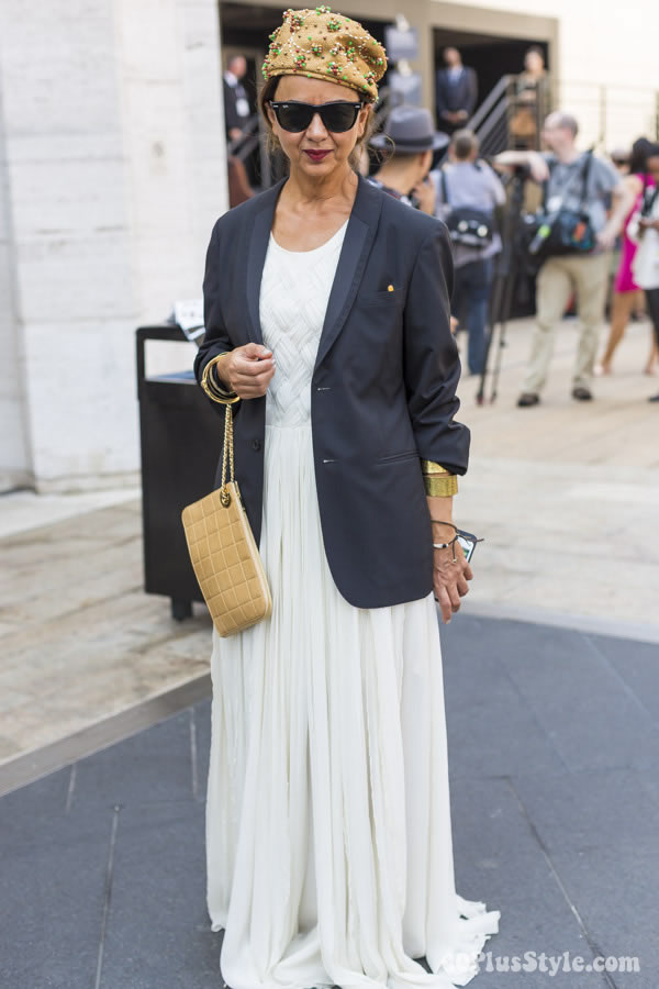 White dress shop with black jacket