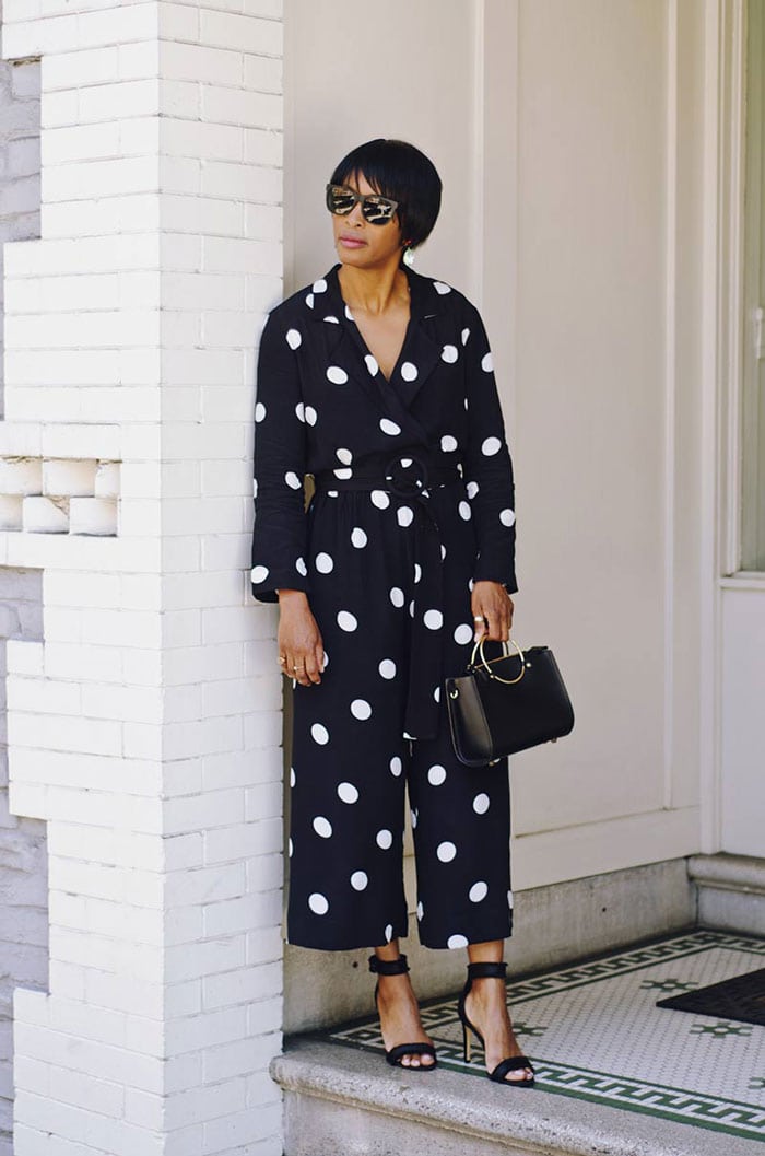 Kim wearing a polka dot jumpsuit | 40plusstyle.com