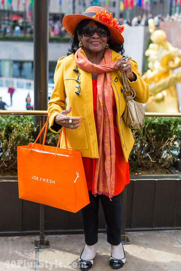 Bright yellow jacket with orange scarf | 40plusstyle.com