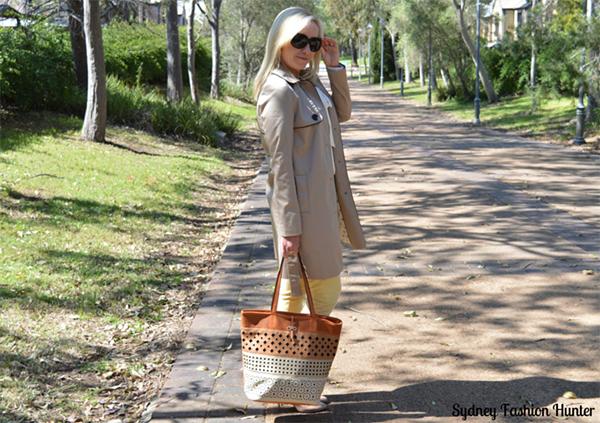 Neutral trench coat and colored pants | 40plusstyle.com