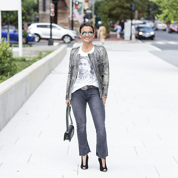 Casual style idea for women over 40: White top, leather jacket, and jeans | 40plusstyle.com