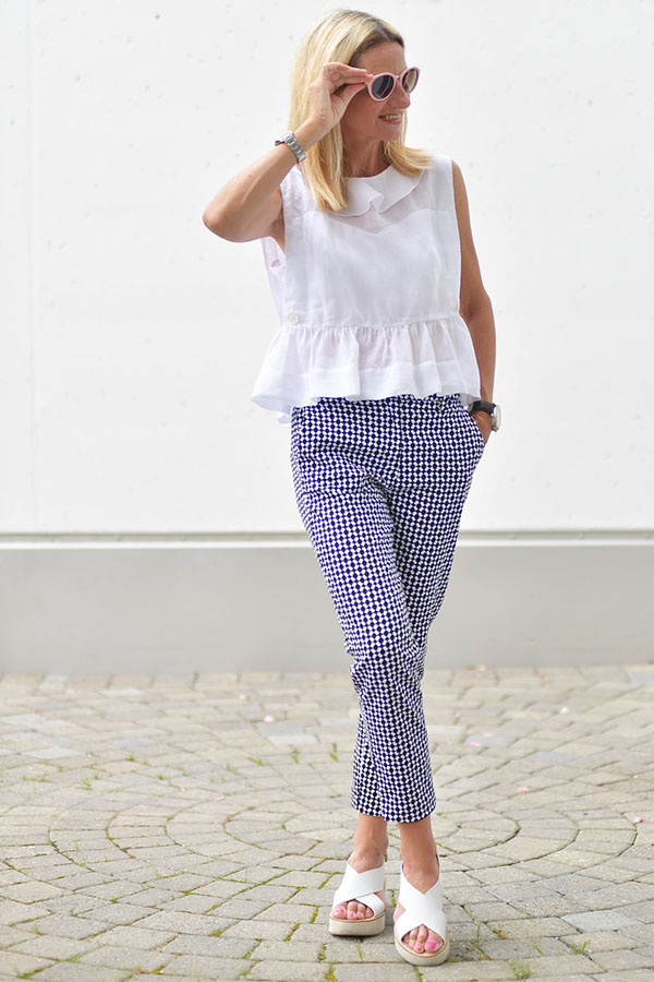 Style idea: White peplum top with patterned pants | 40plusstyle.com