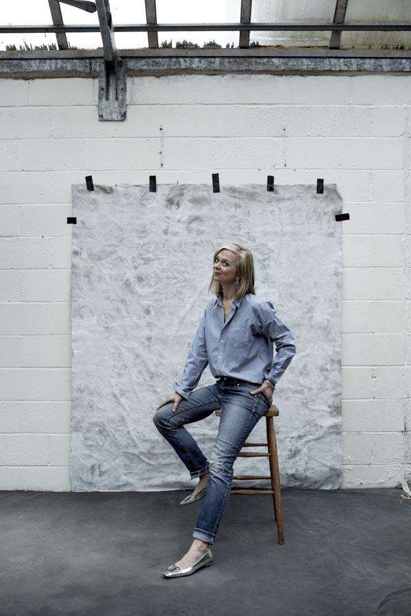 Androgynous fashion inspiration: A loose button down blouse with jeans and silver flats | 40plusstyle.com