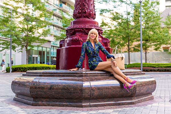 Chic city style: Blue floral romper with heels | 40plusstyle.com