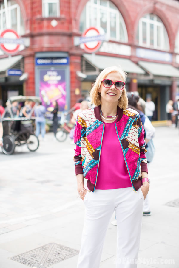 Vibrant and stylish outfit: Pink and printed bomber jacket | 40plusstyle.com