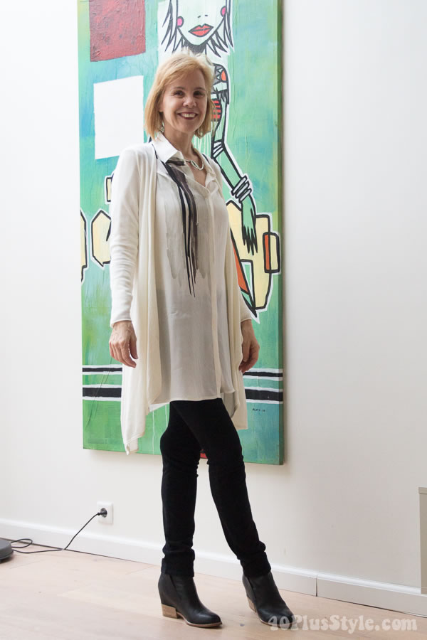 Black pants and cream blouse with asymmetrical long vest | 40plusstyle.com