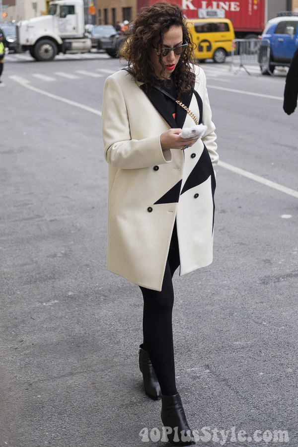 Modern and edgy black and white coat | 40plusstyle.com