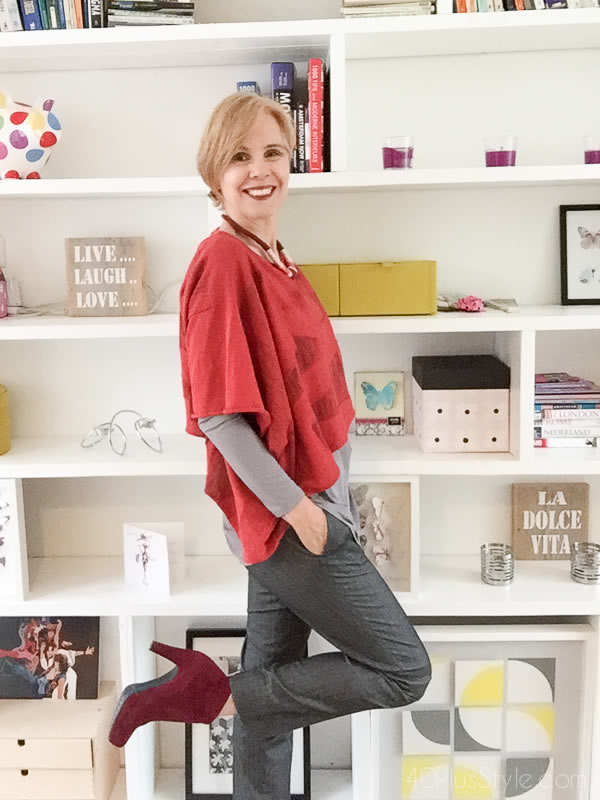 Red cropped top over grey pants - how to do more with less | 40plusstyle.com