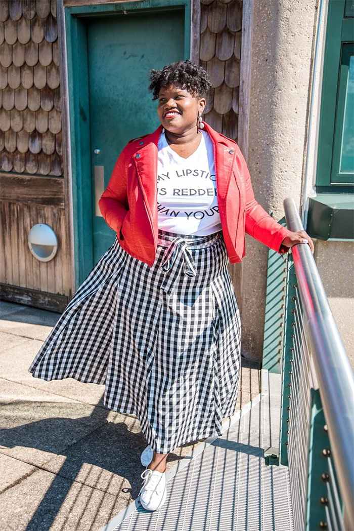 Georgette from Grown and Curvy Women is wearing White Tops over Red Leather Jacket and Checkered Skirt | fashion over 40 | 40plusstyle