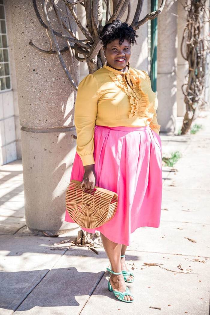 Georgette from Grown and Curvy Women is wearing Yellow Blouse with Pink Skirt and Arc Bamboo bag | fashion over 40 | 40plusstyle