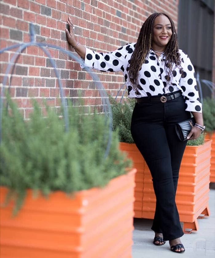 Work outfit idea: black jeans, polka dot print top and heels | 40plusstyle.com