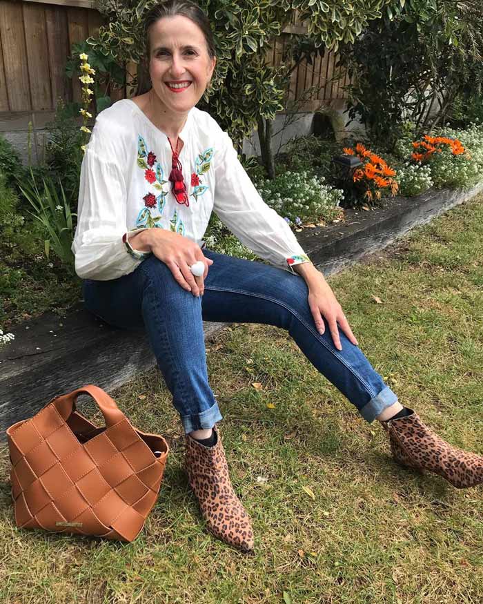 boho look inspiration: embroidered peasant top, jeans and booties | 40plusstyle.com