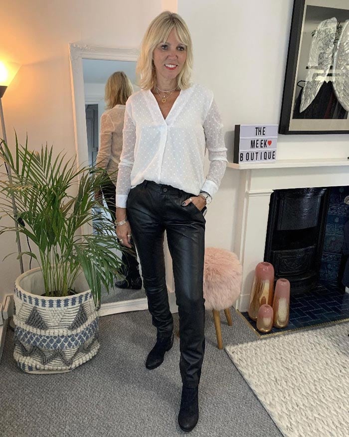 teaming a blouse with leather pants | 40plusstyle.com