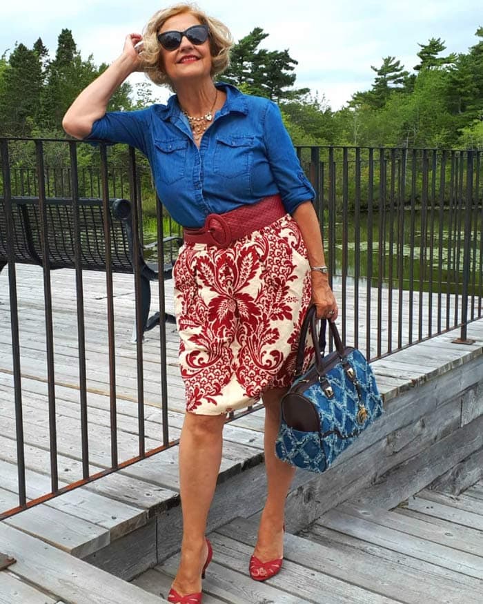 Terrie wearing a button down top, pencil skirt and belt | 40plusstyle.com
