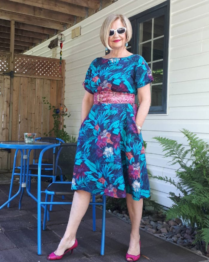 Terri wearing a printed dress with belt | 40plusstyle.com