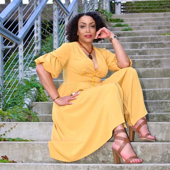 Blogger and influencer Erica wears a yellow dress with sandals | 40plusstyle.com