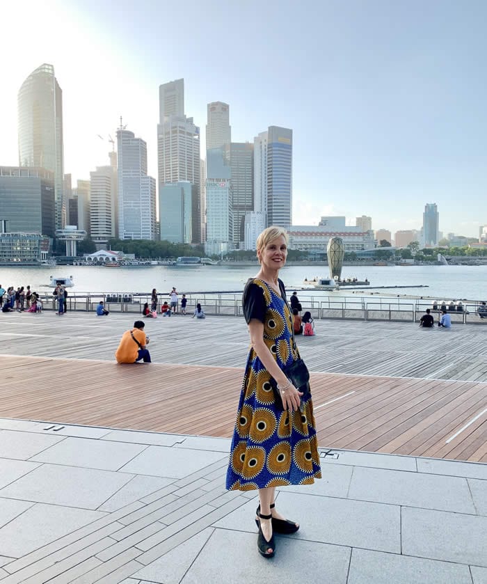 Wearing a sunflower dress at Marina Bay Singapore - ready for my best year ever!