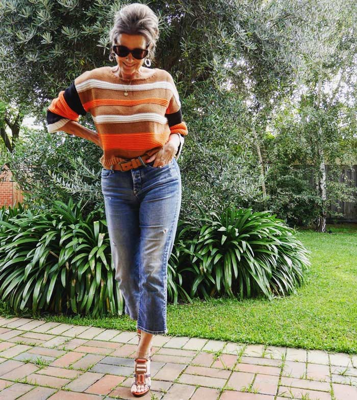 dressing the rectangle shape in a striped sweater and crop flare jeans | 40plusstyle.com