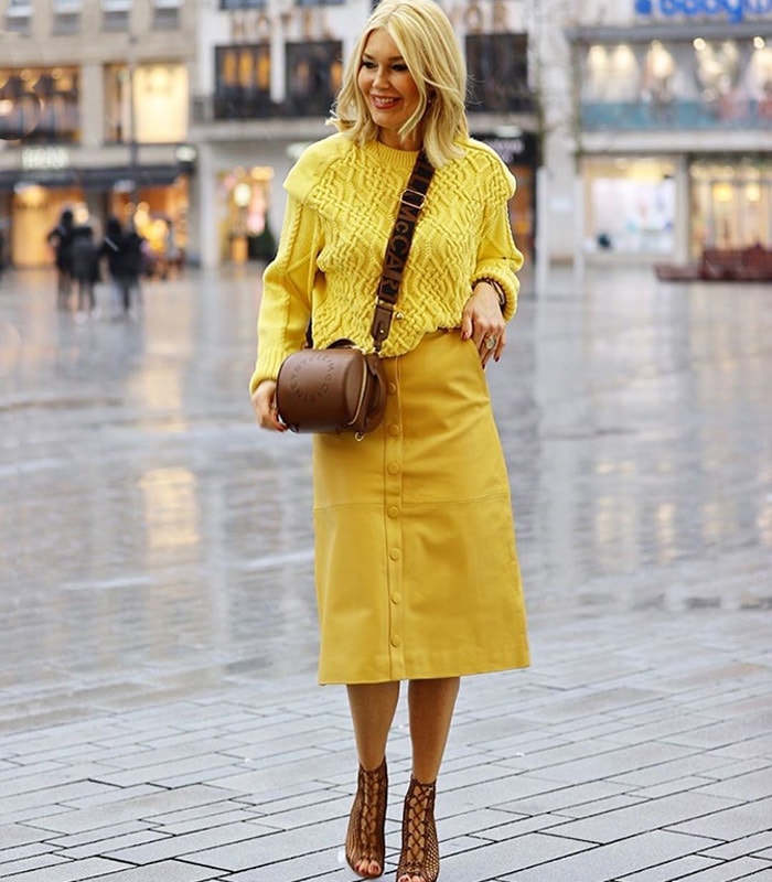 black dress with yellow accessories