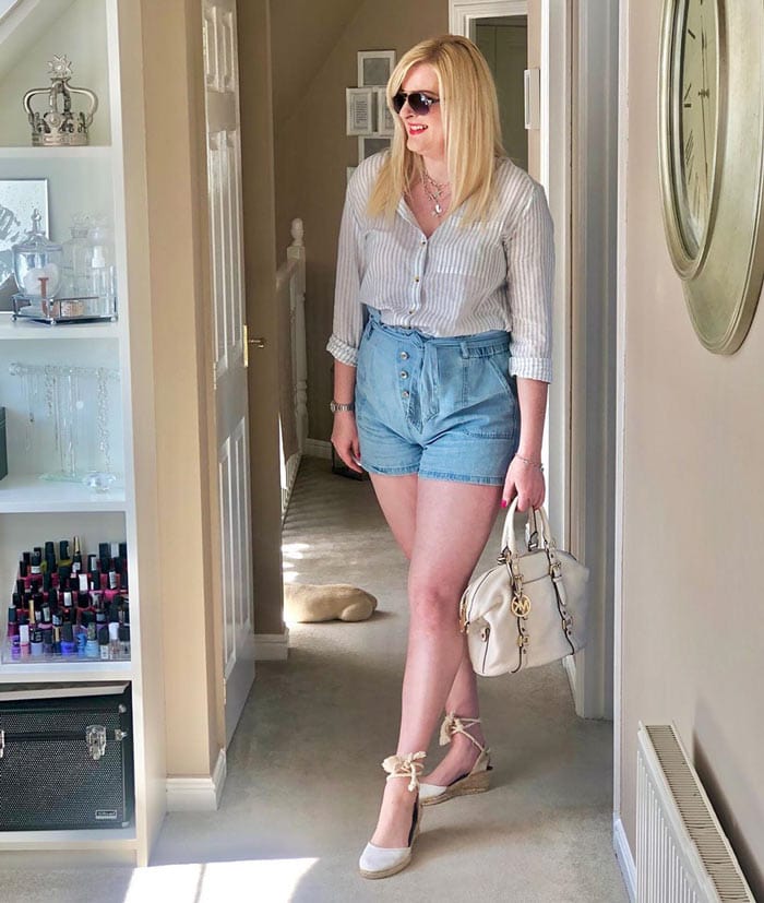 a striped shirt and denim shorts for summer | 40plusstyle.com
