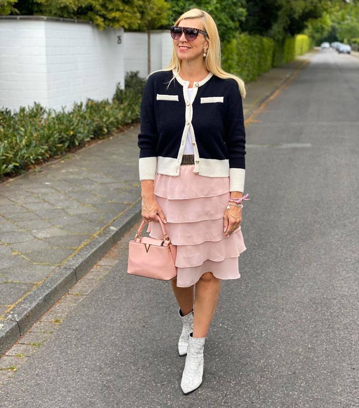 Preppy style: cardigan, skirt and booties | 40plusstyle.com