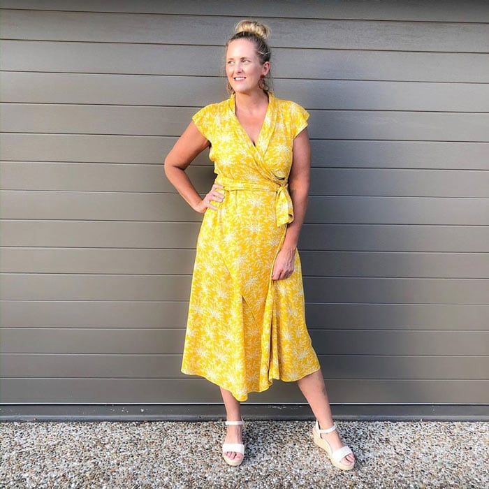 Yellow dress paired with white sandals | 40plusstyle.com