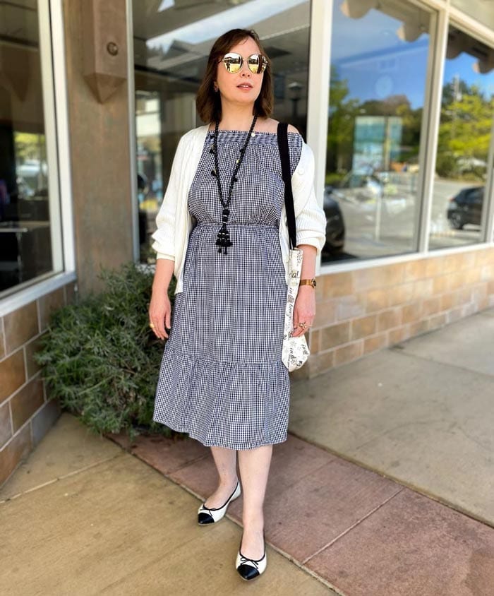 wearing a midi dress with a cardigan | 40plusstyle.com