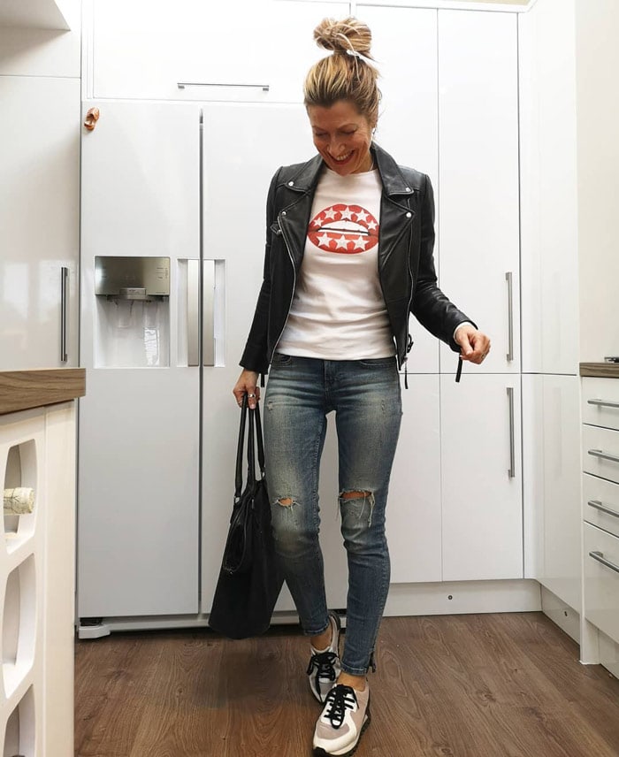 Abi wearing a moto jacket and jeans | 40plusstyle.com