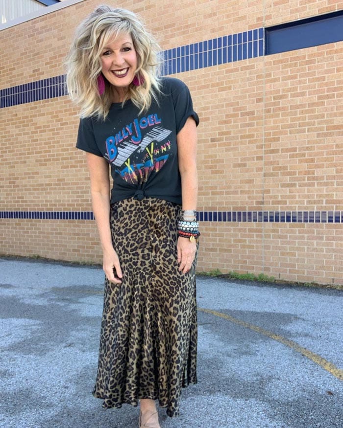 Graphic tee worn with skirt | 40plusstyle.com