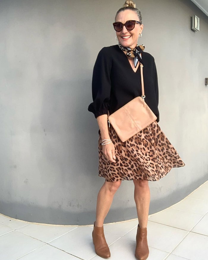 wearing flat booties with animal print | 40plusstyle.com