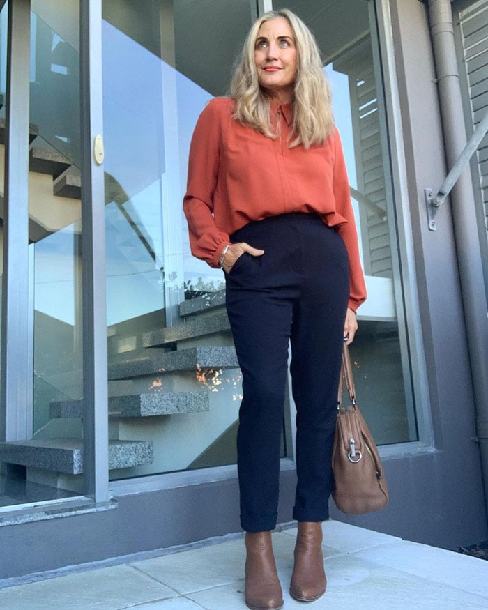 Wearing booties for work - Melinda teams her booties with navy pants | 40plusstyle.com