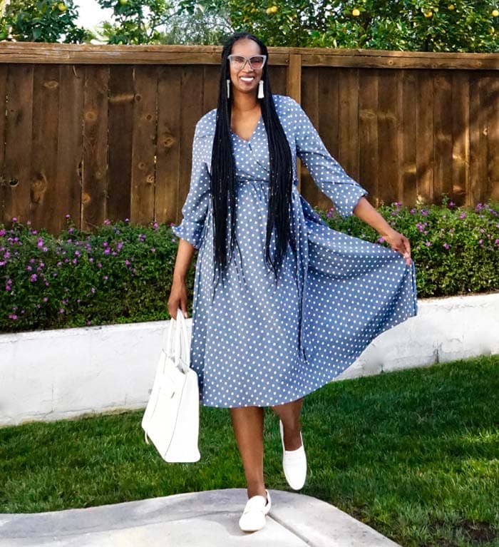 Tanasha wearing white loafers with a summer dress | 40plusstyle.com