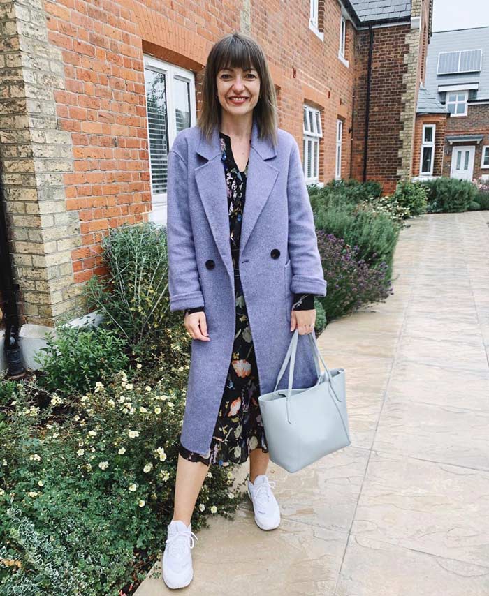 straight coats for women - Lizzi wears a gray double-breasted style | 40plusstyle.com