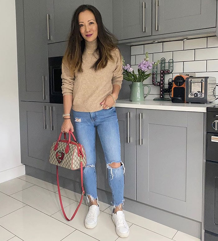 Abi wears a turtleneck with jeans | 40plusstyle.com