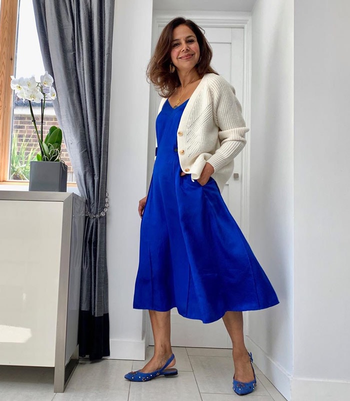 Anita wearing low heel party flats with her matching blue dress | 40plusstyle.com