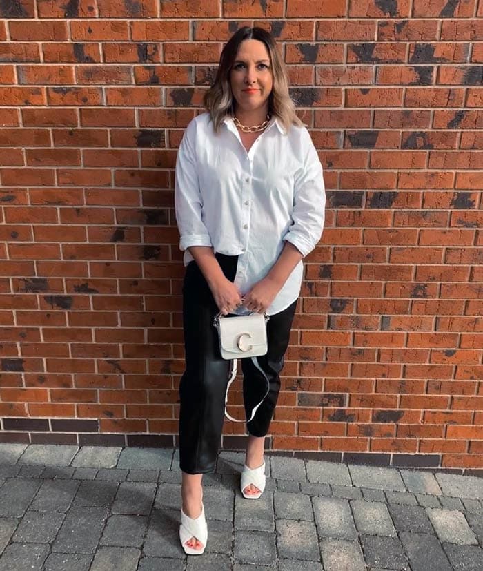 Bev wearing white mules with black pants | 40plusstyle.com