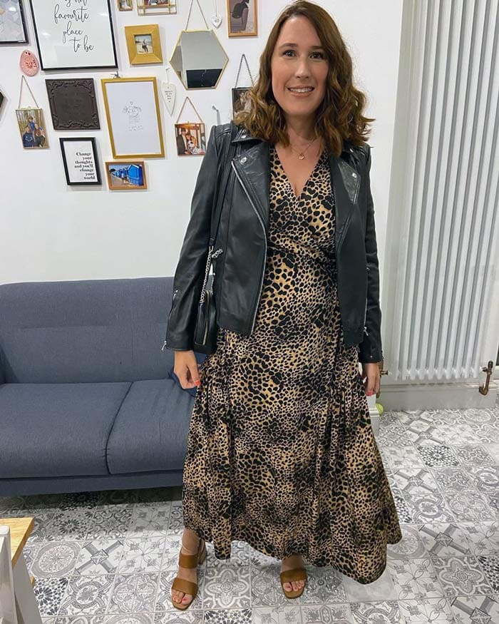 Melissa wears a maxi wrap dress with her moto jacket | 40plusstyle.com