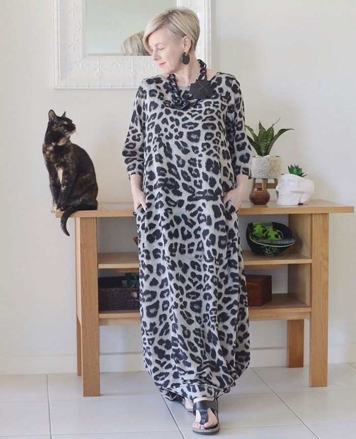 Deborah wears an animal print maxi dress | 40plusstyle.com