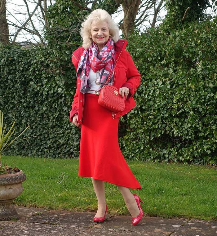 Jo wears an all-red outfit | 40plusstyle.com