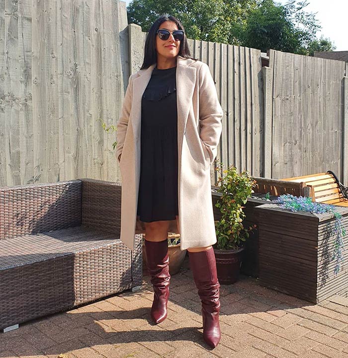 Winter capsule wardrobe - Jas wears a neutral outfit with burgundy booties | 40plusstyle.com