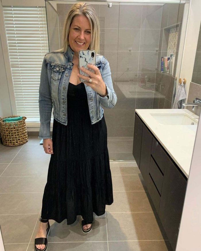 Beth wears her black dress with a denim jacket | 40plusstyle.com