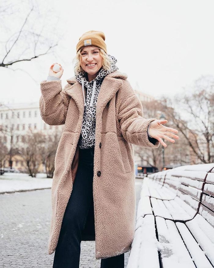 Irena wears a hat and teddy bear coat | 40plusstyle.com