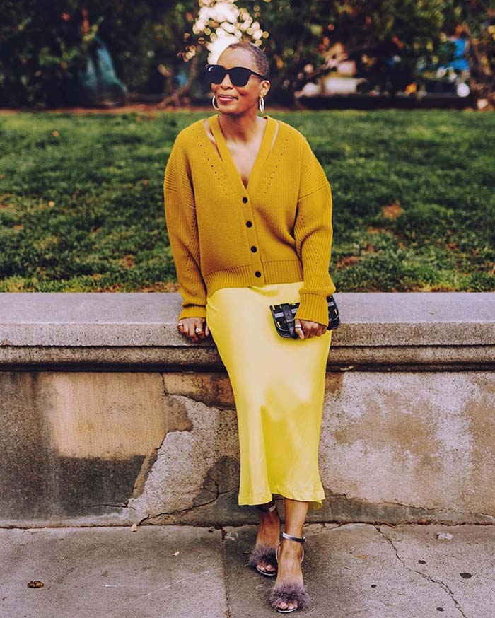 Kim in a yellow skirt and cardigan | 40plusstyle.com